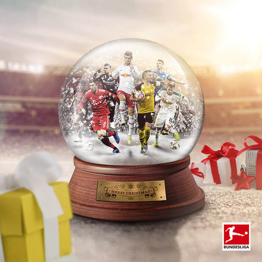photoshop montage of bundesliga players in a snowglobe