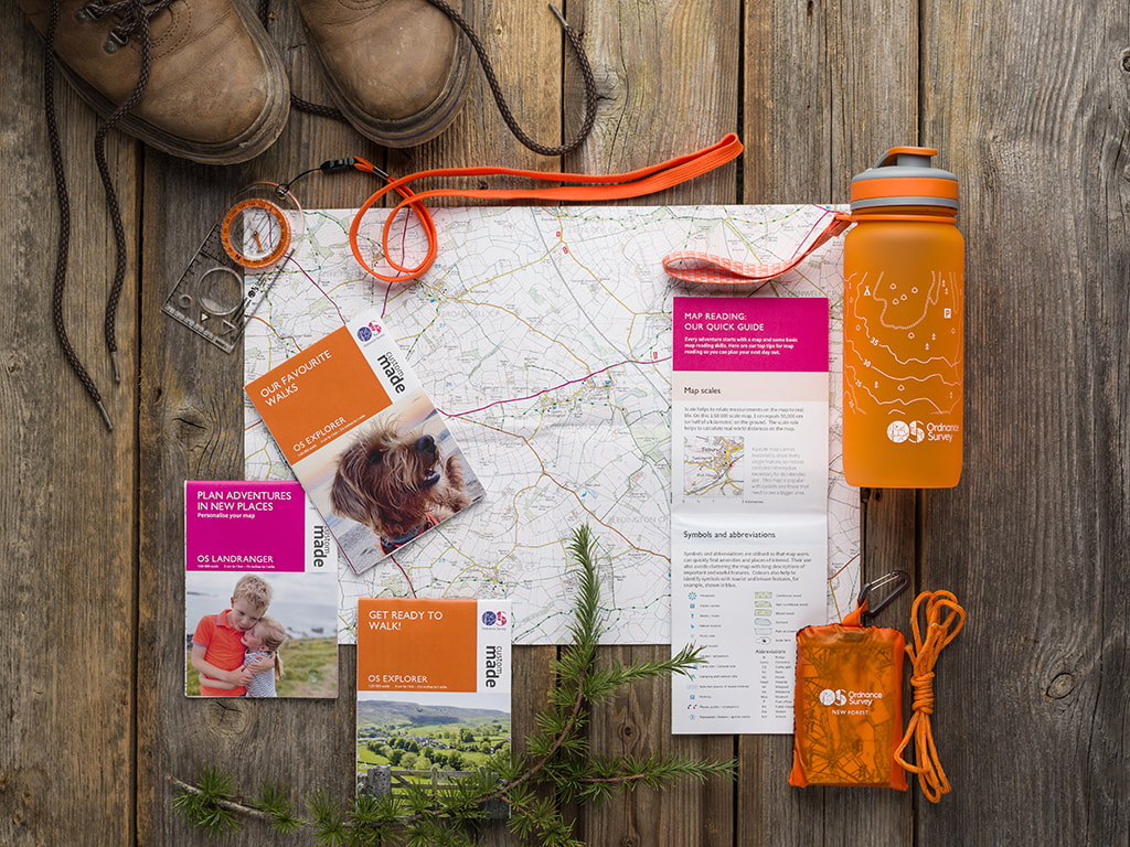 sordnace survey maps photographed froma bove and styled with outdoor items